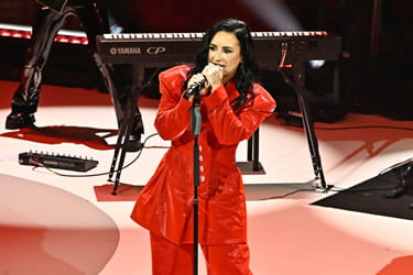 Demi Lovato performing at the Red Dress Collection Concert