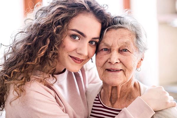 portrait of young woman with grandmother portrait of young woman with grandmother