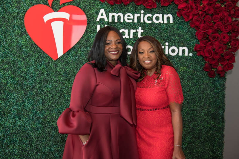 Star Jones (right), along with then-incoming American Heart Association President Dr. Michelle Albert, helps the AHA focus attention on women and heart disease at a 2022 Go Red for Women Red Dress Collection event in Los Angeles. (American Heart Association)