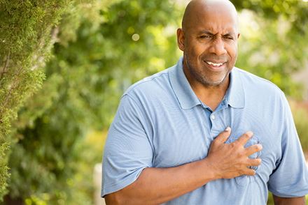 bald man holding chest bald man holding chest