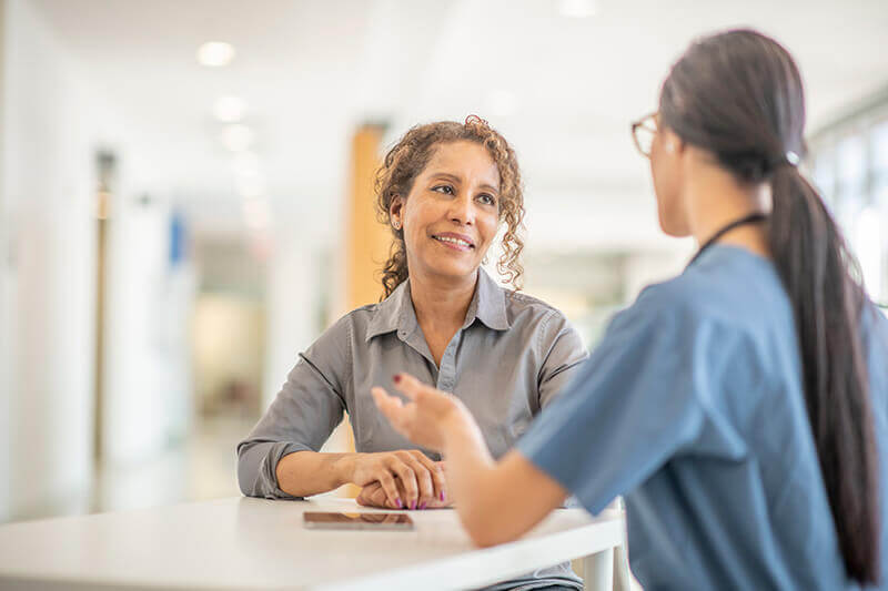 doctor or scientist explains to patient doctor or scientist explains to patient
