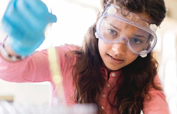 young girl experimenting young girl experimenting