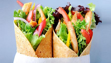 healthy wrap close up of two healthy chicken wrap