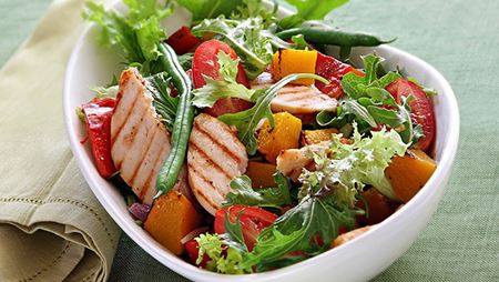 bowl of salad with grilled chicken and peaches salad bowl of grilled chicken and peaches