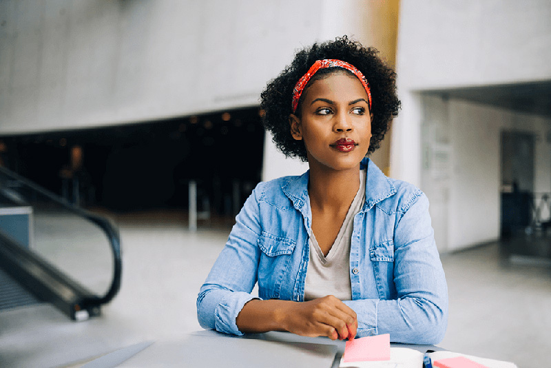 young female entrepreneur thinking young female entrepreneur thinking
